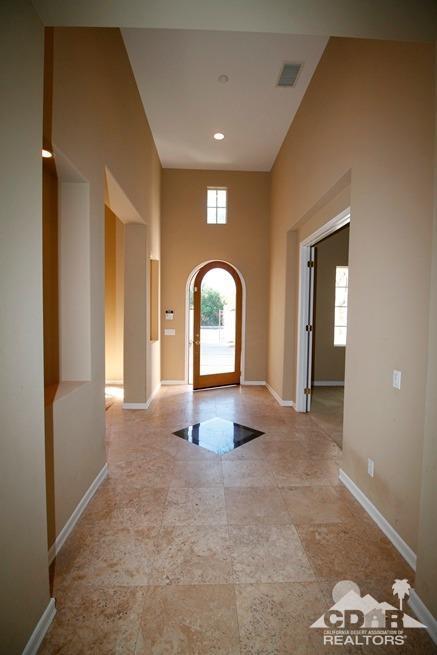 324 Loch Lomond Road Rancho Mirage, CA 92270 - Photo 24 of 51 a view of a livingroom with a large window