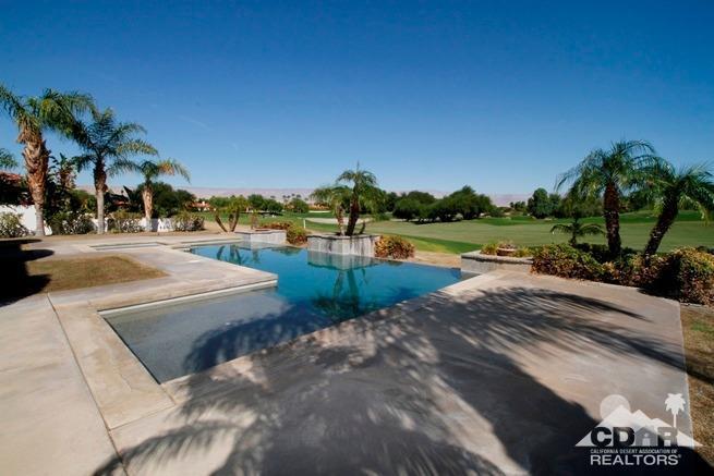 324 Loch Lomond Road Rancho Mirage, CA 92270 - Photo 38 of 51 a view of a lake with houses