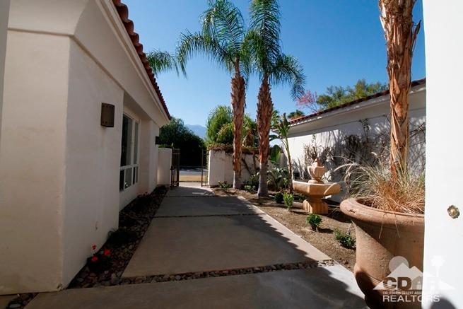 324 Loch Lomond Road Rancho Mirage, CA 92270 - Photo 5 of 51 a view of a house with a backyard