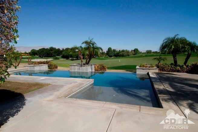 324 Loch Lomond Road Rancho Mirage, CA 92270 - Photo 41 of 51 a view of a swimming pool with a yard