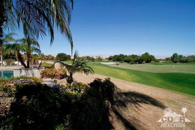 324 Loch Lomond Road Rancho Mirage, CA 92270 - Photo 42 of 51 a view of a lake with a big yard
