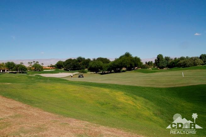 324 Loch Lomond Road Rancho Mirage, CA 92270 - Photo 47 of 51 a view of a golf course with a lake