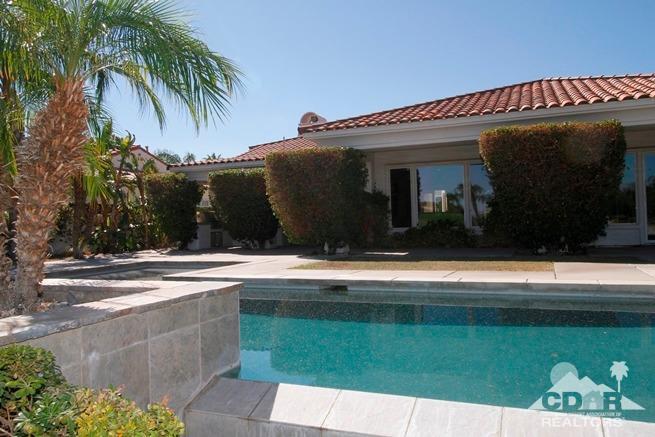 324 Loch Lomond Road Rancho Mirage, CA 92270 - Photo 49 of 51 a view of a house with a swimming pool