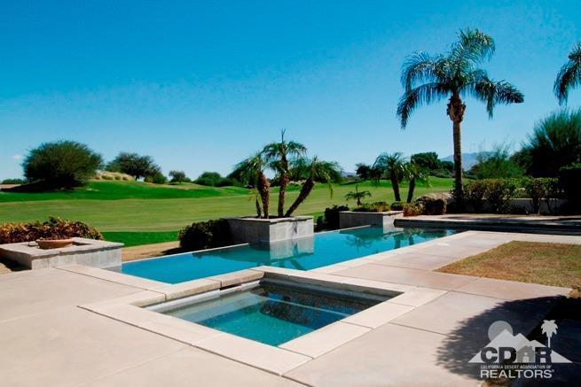 324 Loch Lomond Road Rancho Mirage, CA 92270 - Photo 50 of 51 a view of a swimming pool and lounge chairs