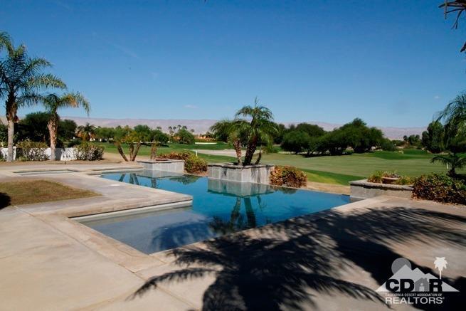 324 Loch Lomond Road Rancho Mirage, CA 92270 - Photo 51 of 51 a view of a swimming pool with an outdoor space and seating area