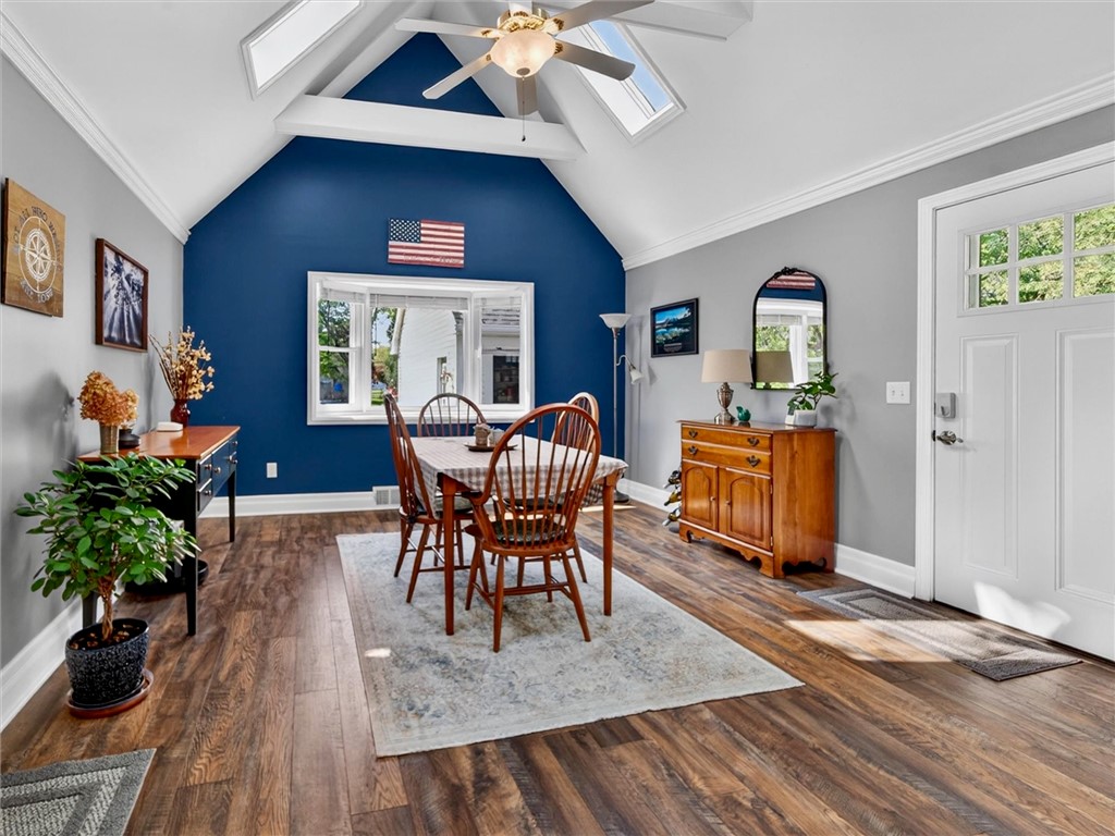 531 Rondo Lane Webster, NY 14580 - Photo 14 of 47 Great room with cathedral ceiling and skylights