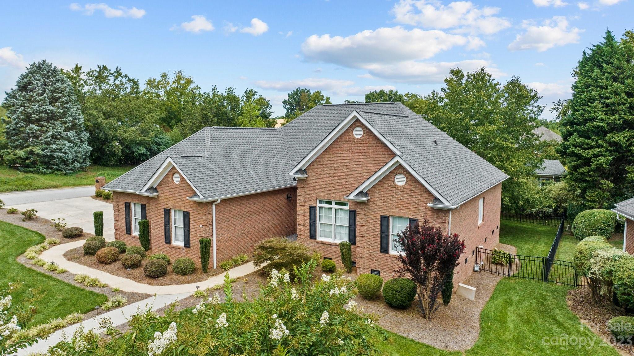 308 Gringley Hill Road Fort Mill, SC 29708 - Photo 2 of 23 a front view of a house with garden