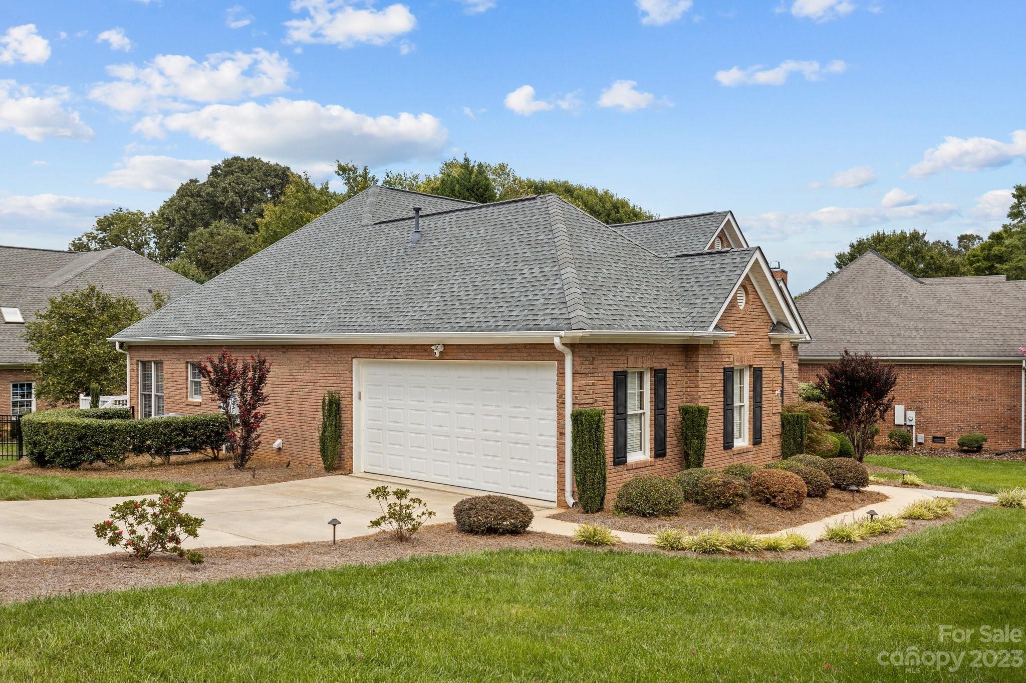 308 Gringley Hill Road Fort Mill, SC 29708 - Photo 22 of 23 a front view of a house with garden