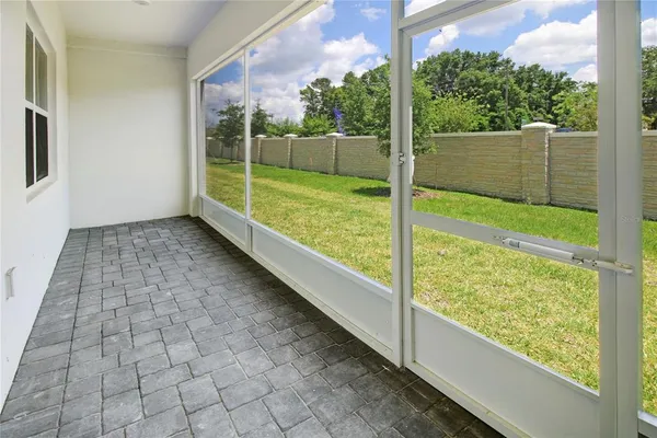 a view of a room with a large window
