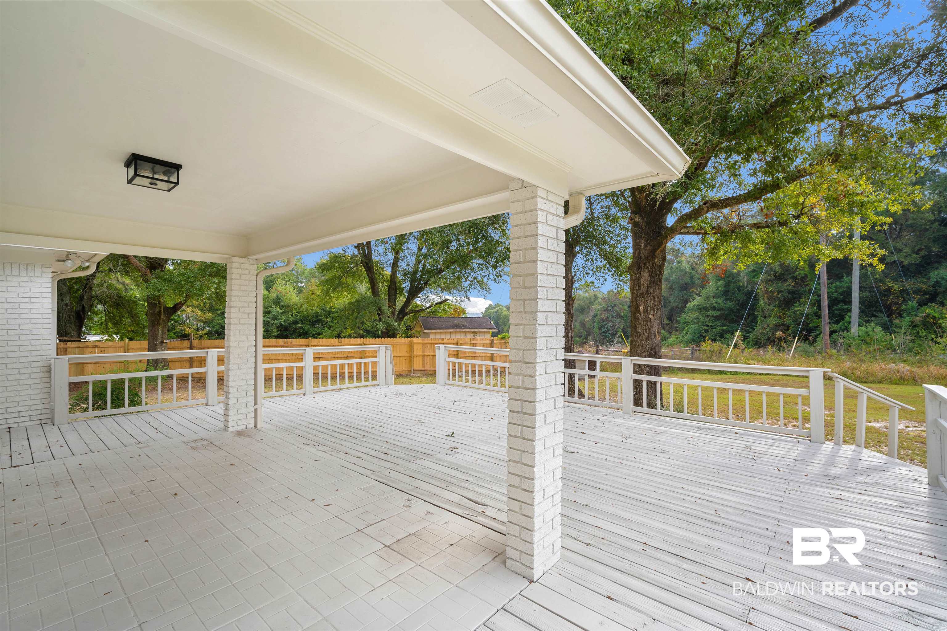3050 Lacoste Road Mobile, AL 36618 - Photo 26 of 30 Deck with a patio area