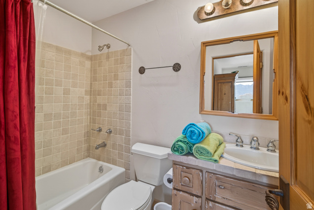 3617 Red Rock Drive Moab, UT 84532 - Photo 77 of 79 Full bath featuring vanity and shower / bath combo with shower curtain