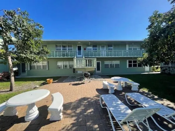 front view of a house with a patio