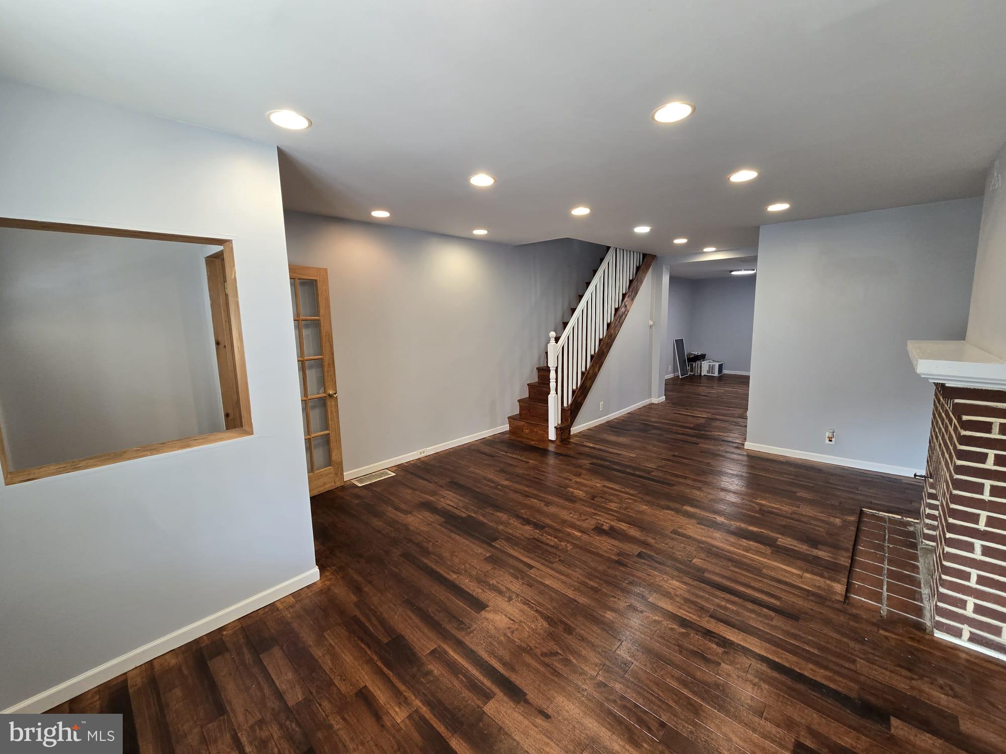 3410 North 16th Street Philadelphia, PA 19140 - Photo 4 of 20 a view of entryway and hall with wooden floor