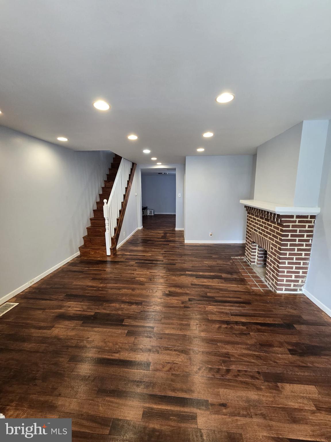 3410 North 16th Street Philadelphia, PA 19140 - Photo 6 of 20 a view of an empty room with wooden floor