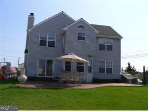 257 Allen Road Bayville, NJ 08721 - Photo 2 of 12 a front view of a house with a yard