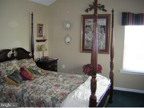 257 Allen Road Bayville, NJ 08721 - Photo 12 of 12 a bedroom with a bed and a window