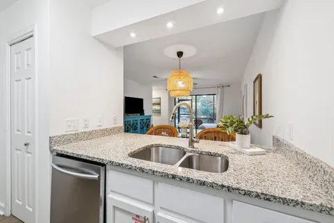 a kitchen with a stove and a microwave