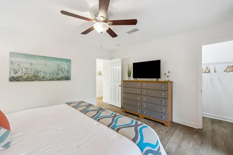 a view of a balcony with wooden floor