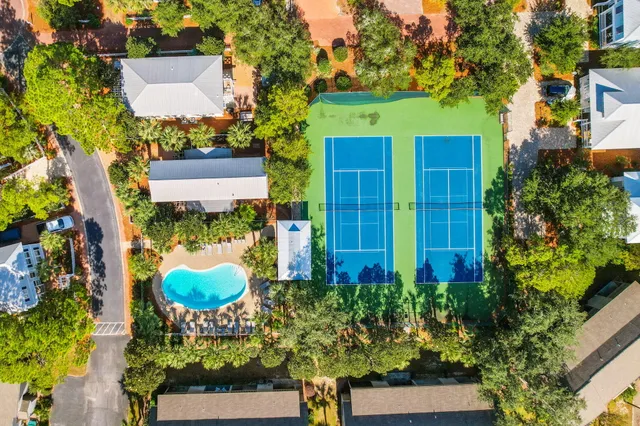 a view of an outdoor space and tennis court