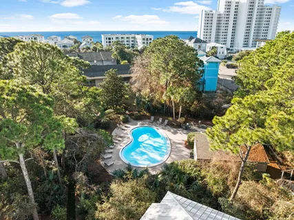 a view of a swimming pool with a patio