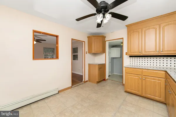 a view of a kitchen with a sink and dishwasher