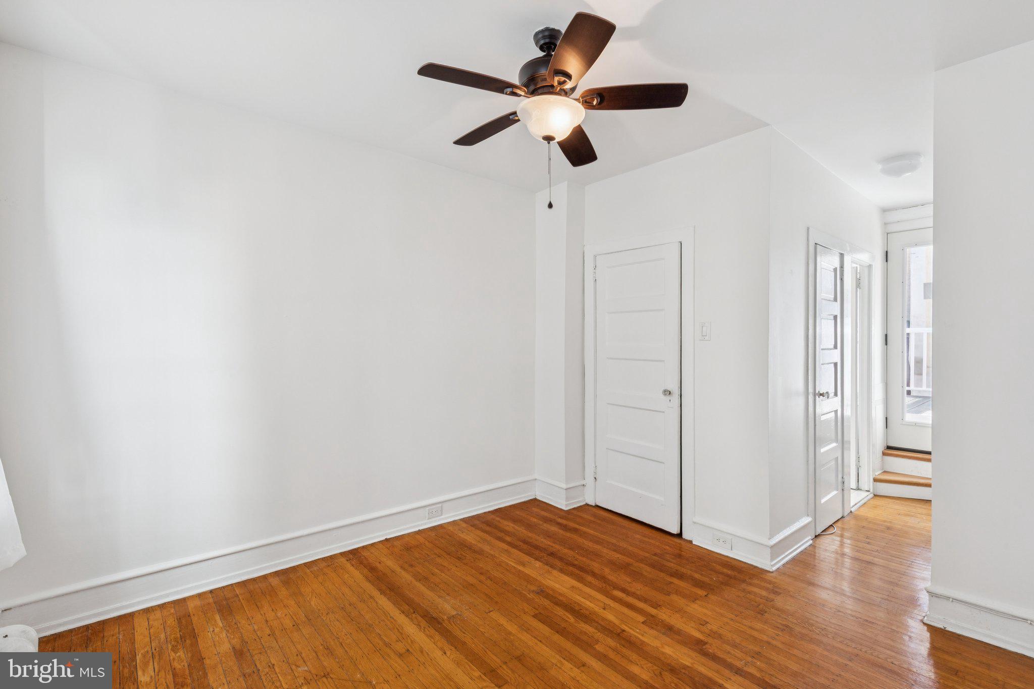 1830 R Manning Street, Unit 2 Philadelphia, PA 19103 - Photo 21 of 32 a view of an empty room with wooden floor