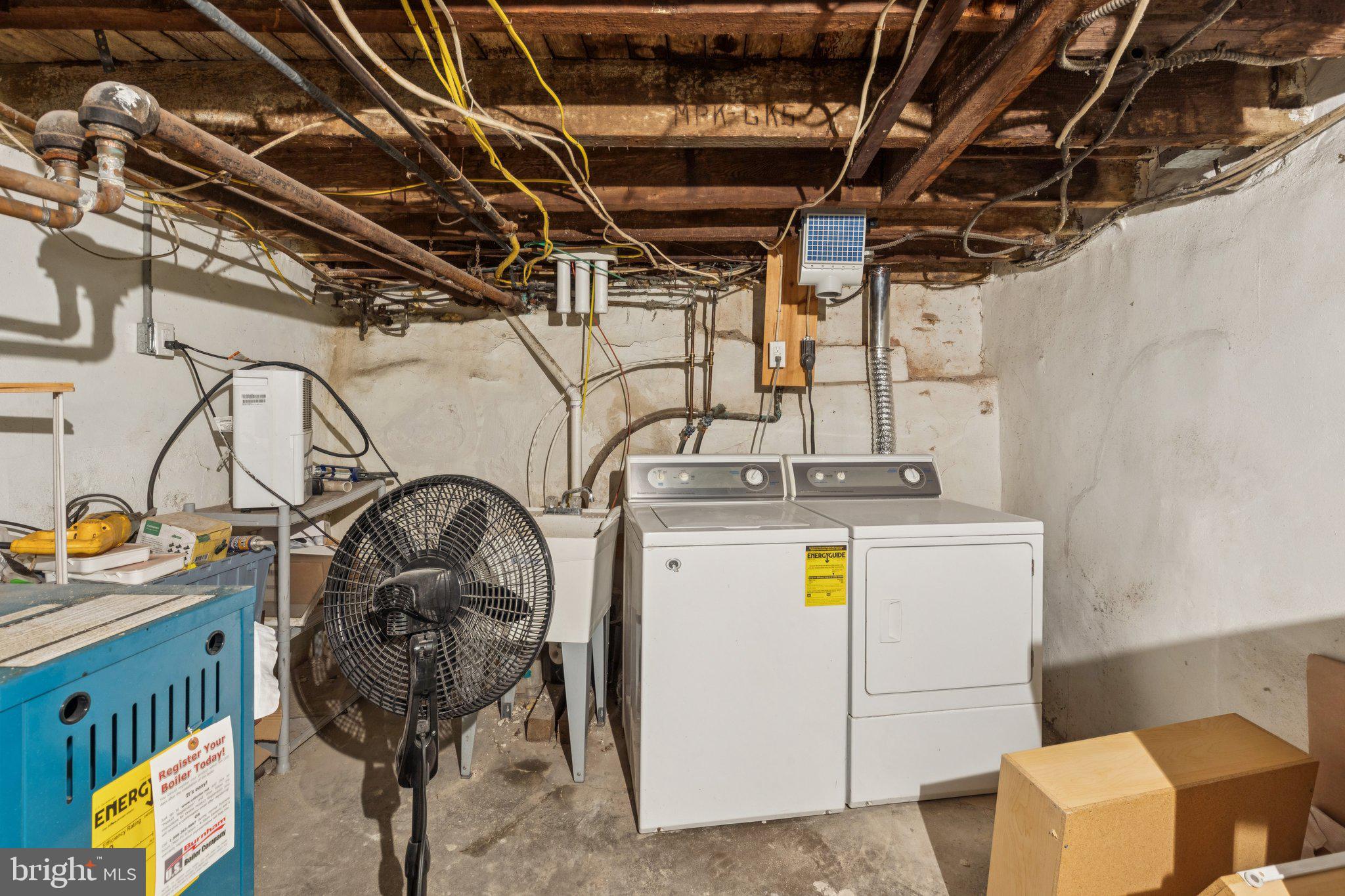 1830 R Manning Street, Unit 2 Philadelphia, PA 19103 - Photo 28 of 32 a utility room with dryer and washer