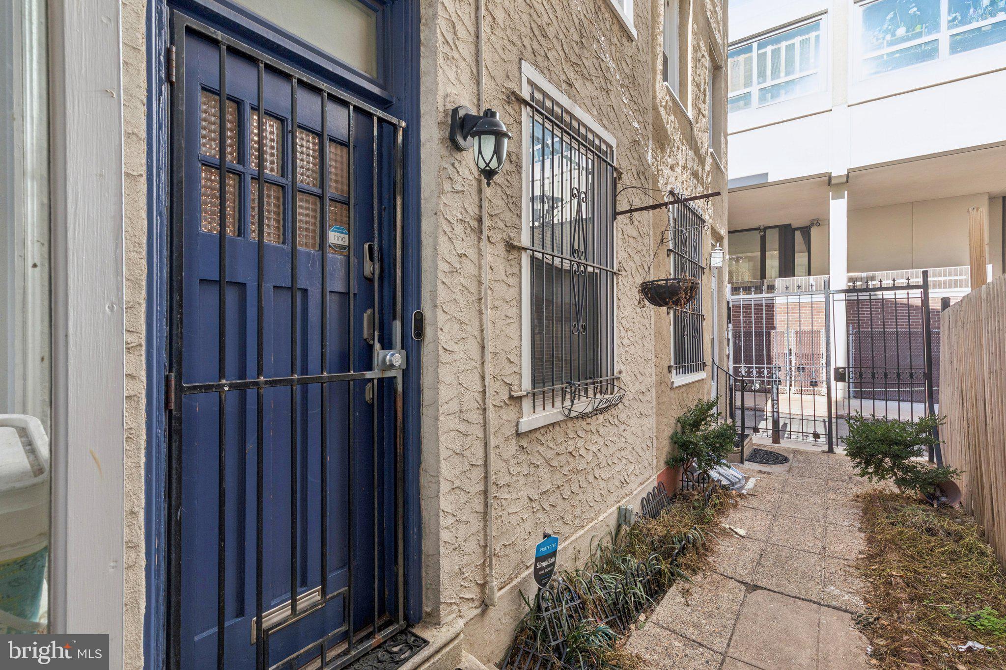1830 R Manning Street, Unit 2 Philadelphia, PA 19103 - Photo 30 of 32 a view of a back yard of a house