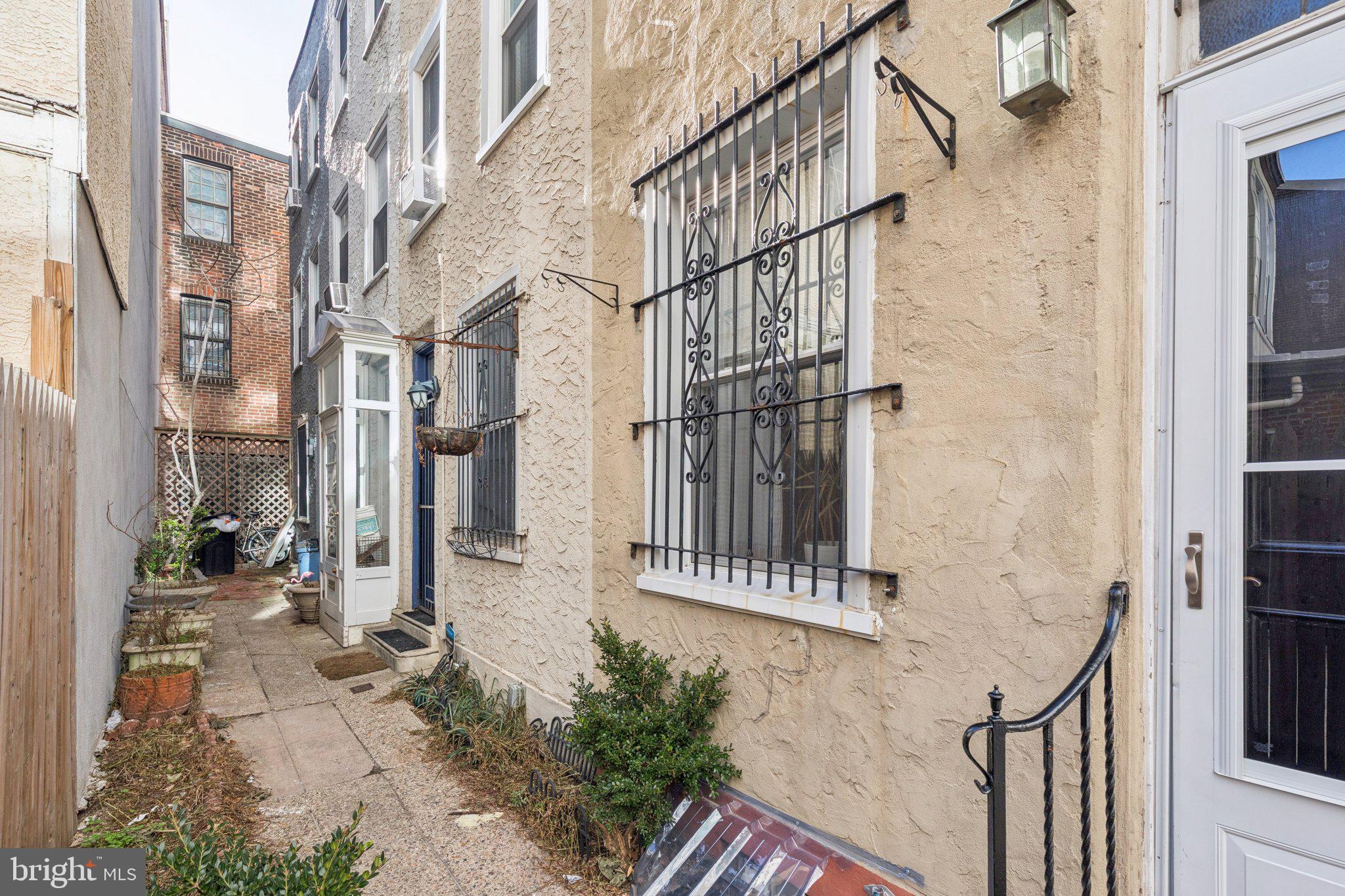 1830 R Manning Street, Unit 2 Philadelphia, PA 19103 - Photo 32 of 32 a view of a brick buidling front with many windows