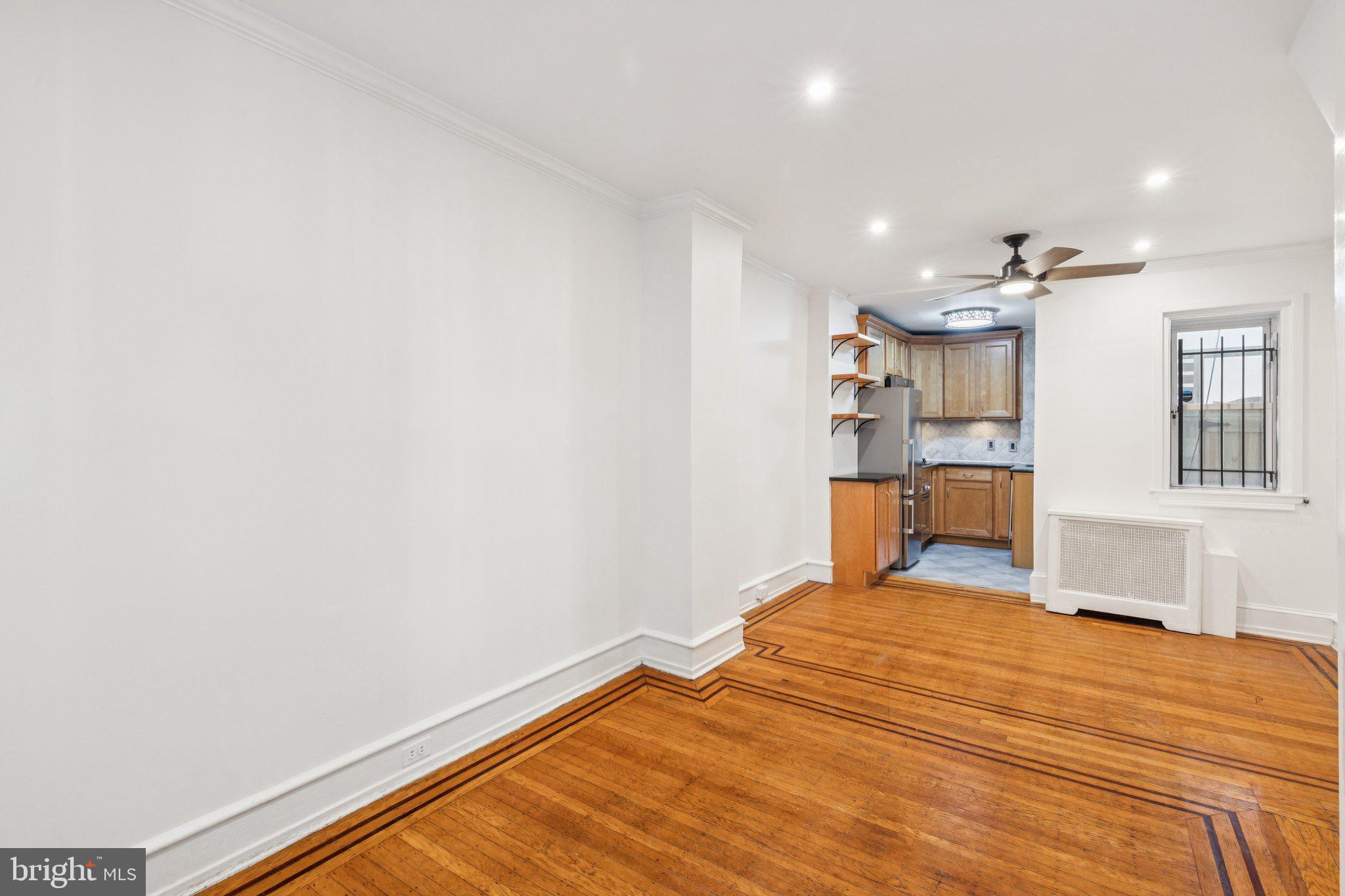 1830 R Manning Street, Unit 2 Philadelphia, PA 19103 - Photo 6 of 32 a room with a bed and cabinets