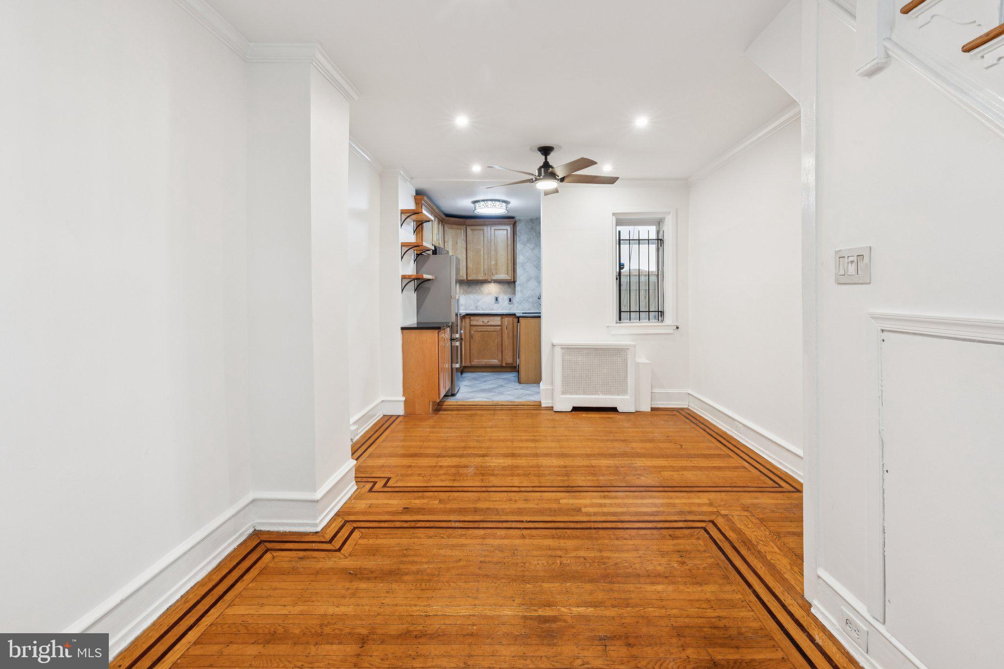 1830 R Manning Street, Unit 2 Philadelphia, PA 19103 - Photo 7 of 32 a bedroom with a bed and cabinets
