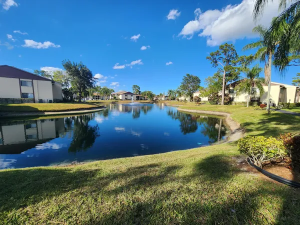 a view of a lake with a house