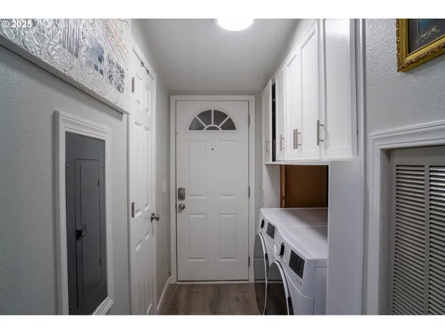 a view of a kitchen from the hallway