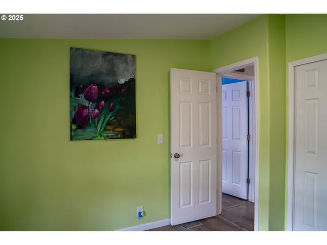 a view of backyard with green space and seating