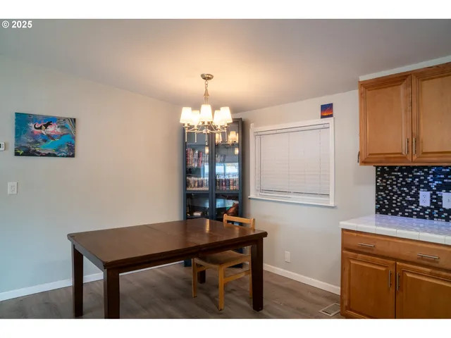 a view of a kitchen with granite countertop lots of counter top space