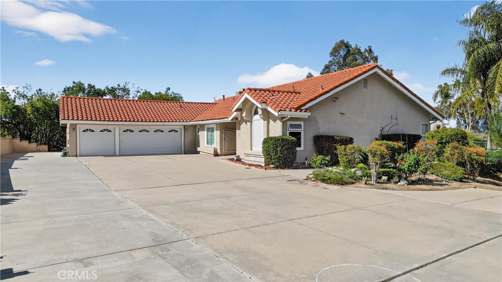 11056 Orchard View Lane Riverside, CA 92503 - Photo 3 of 50 front view of a house with a yard