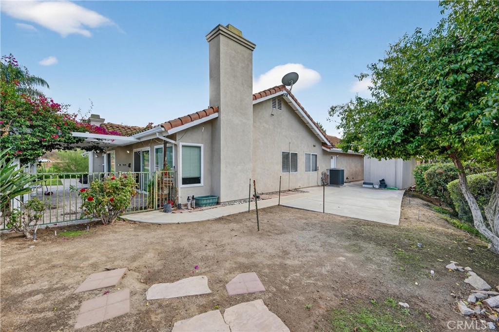 11056 Orchard View Lane Riverside, CA 92503 - Photo 41 of 50 a house with trees in the background