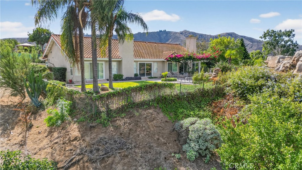 11056 Orchard View Lane Riverside, CA 92503 - Photo 44 of 50 a view of swimming pool with a garden and plants