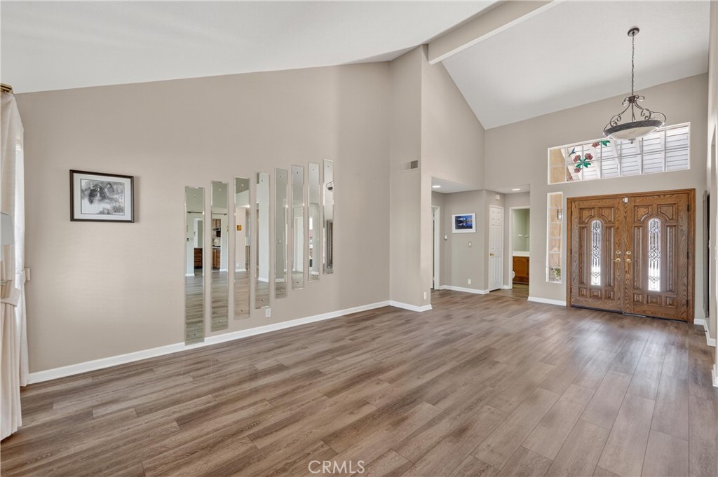 11056 Orchard View Lane Riverside, CA 92503 - Photo 8 of 50 a view of a big room with wooden floor and windows