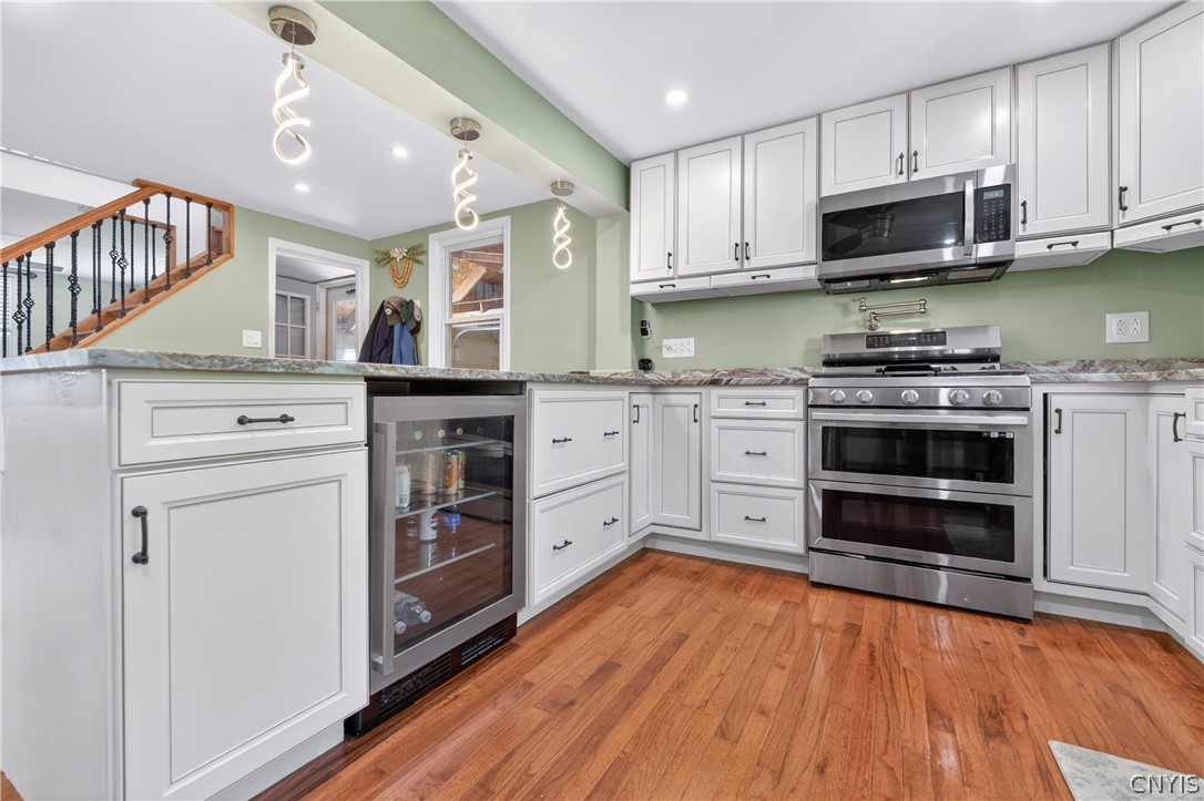 404 Oakwood Street Rome, NY 13440 - Photo 4 of 48 Double oven and beverage fridge