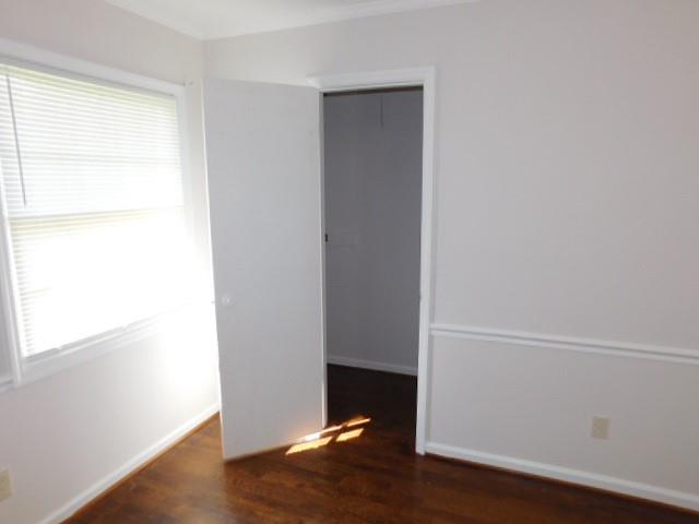 879 Forest Ridge Drive Southeast Marietta, GA 30067 - Photo 16 of 29 an empty room with wooden floor