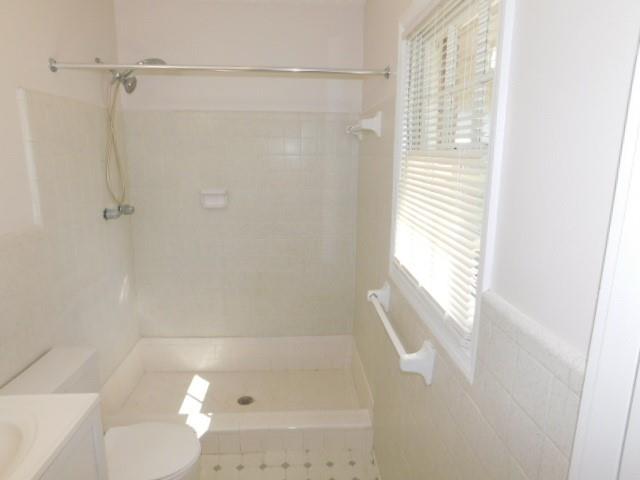 879 Forest Ridge Drive Southeast Marietta, GA 30067 - Photo 18 of 29 a bathroom with a bathtub and shower