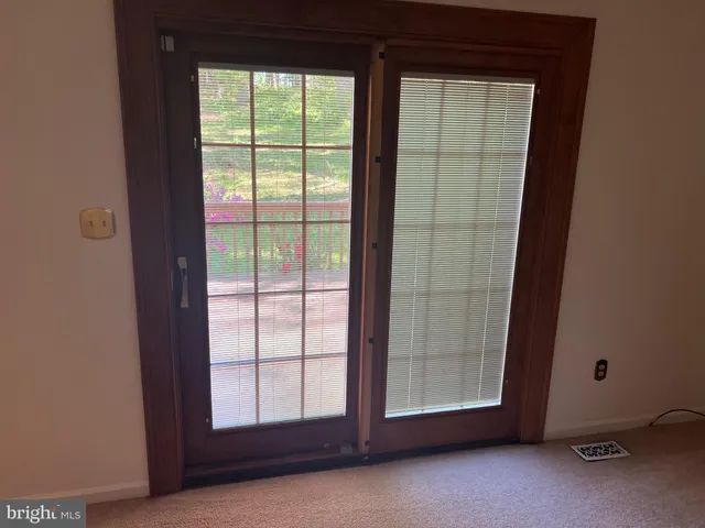 a view of stairs and wooden floor