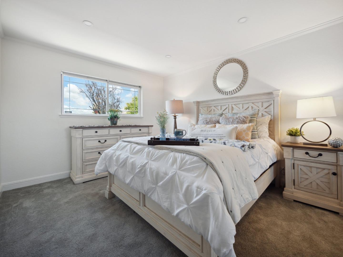 205 Evergreen Way Milpitas, CA 95035 - Photo 16 of 31 a bed room with a bed and two windows