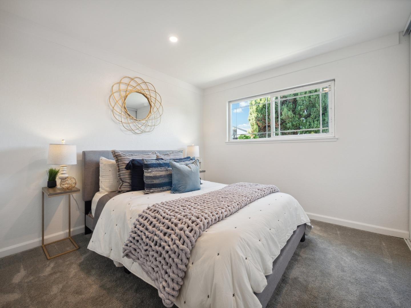 205 Evergreen Way Milpitas, CA 95035 - Photo 17 of 31 a bedroom with bed and window