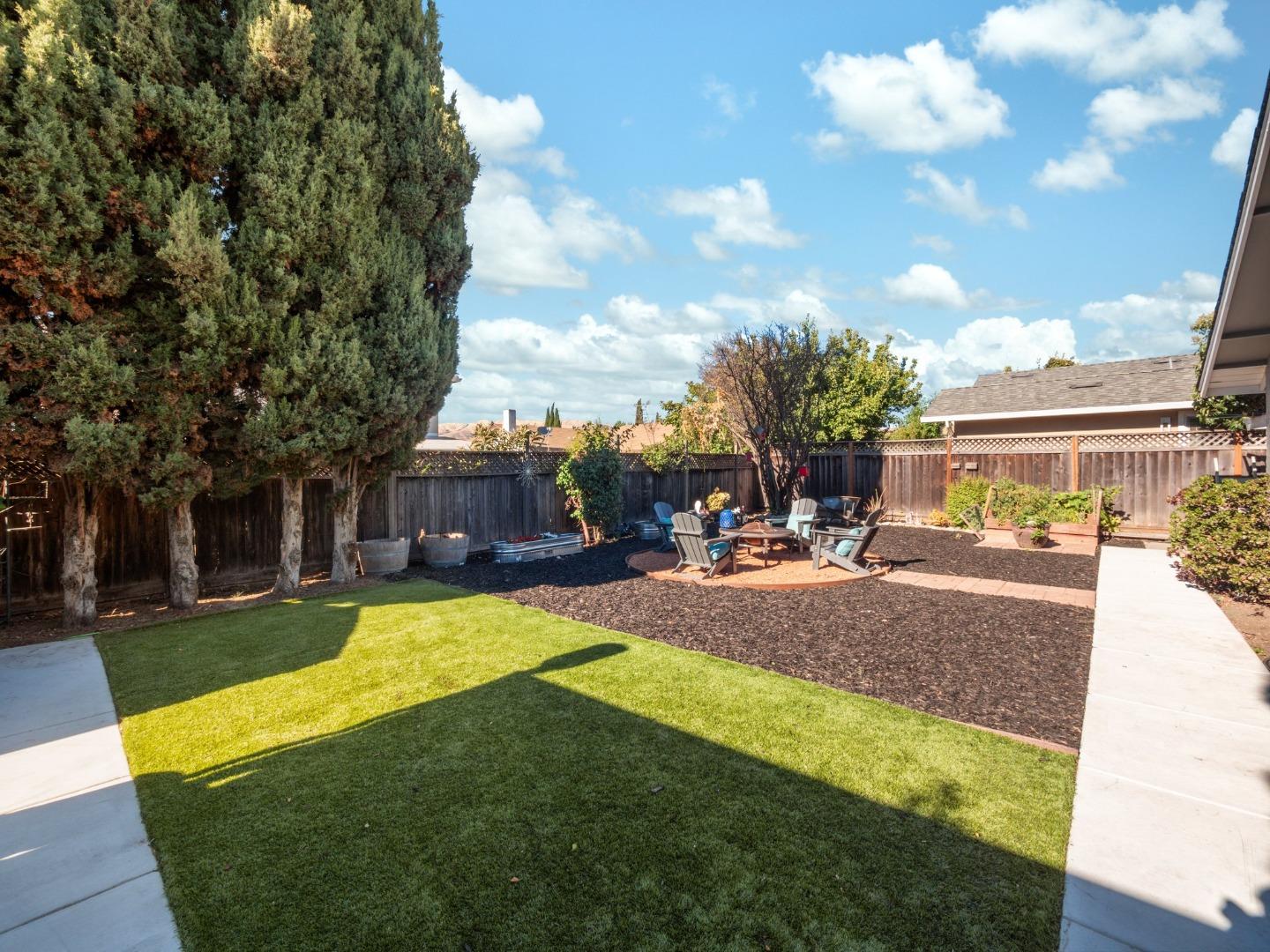205 Evergreen Way Milpitas, CA 95035 - Photo 23 of 31 a view of a swimming pool with sitting area