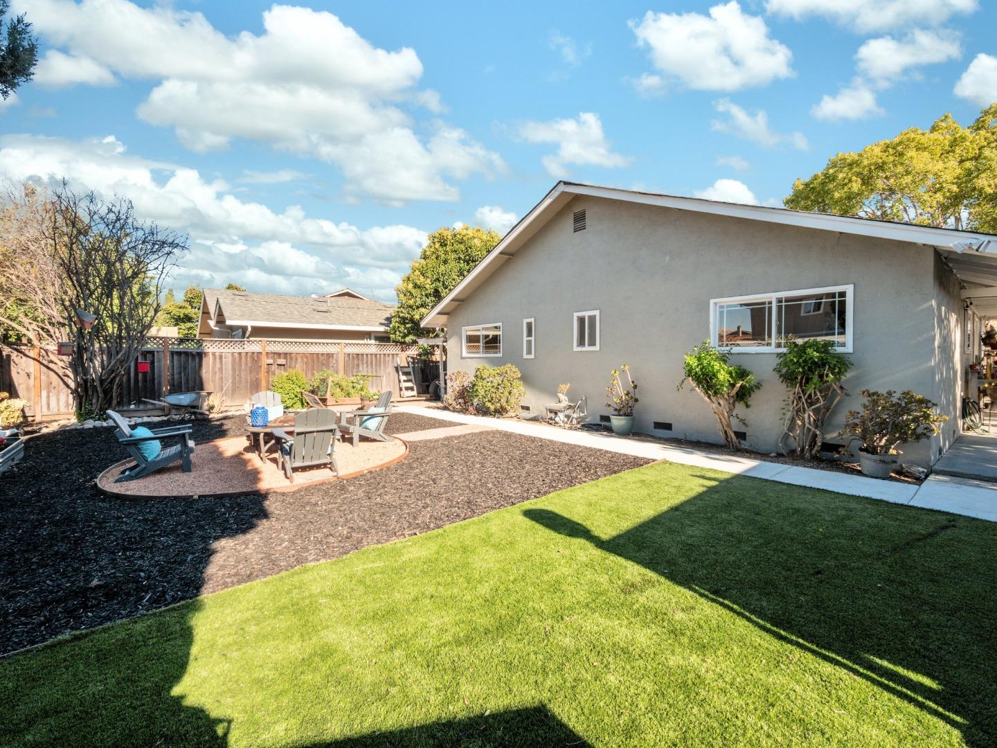 205 Evergreen Way Milpitas, CA 95035 - Photo 24 of 31 a view of a backyard with plants and patio