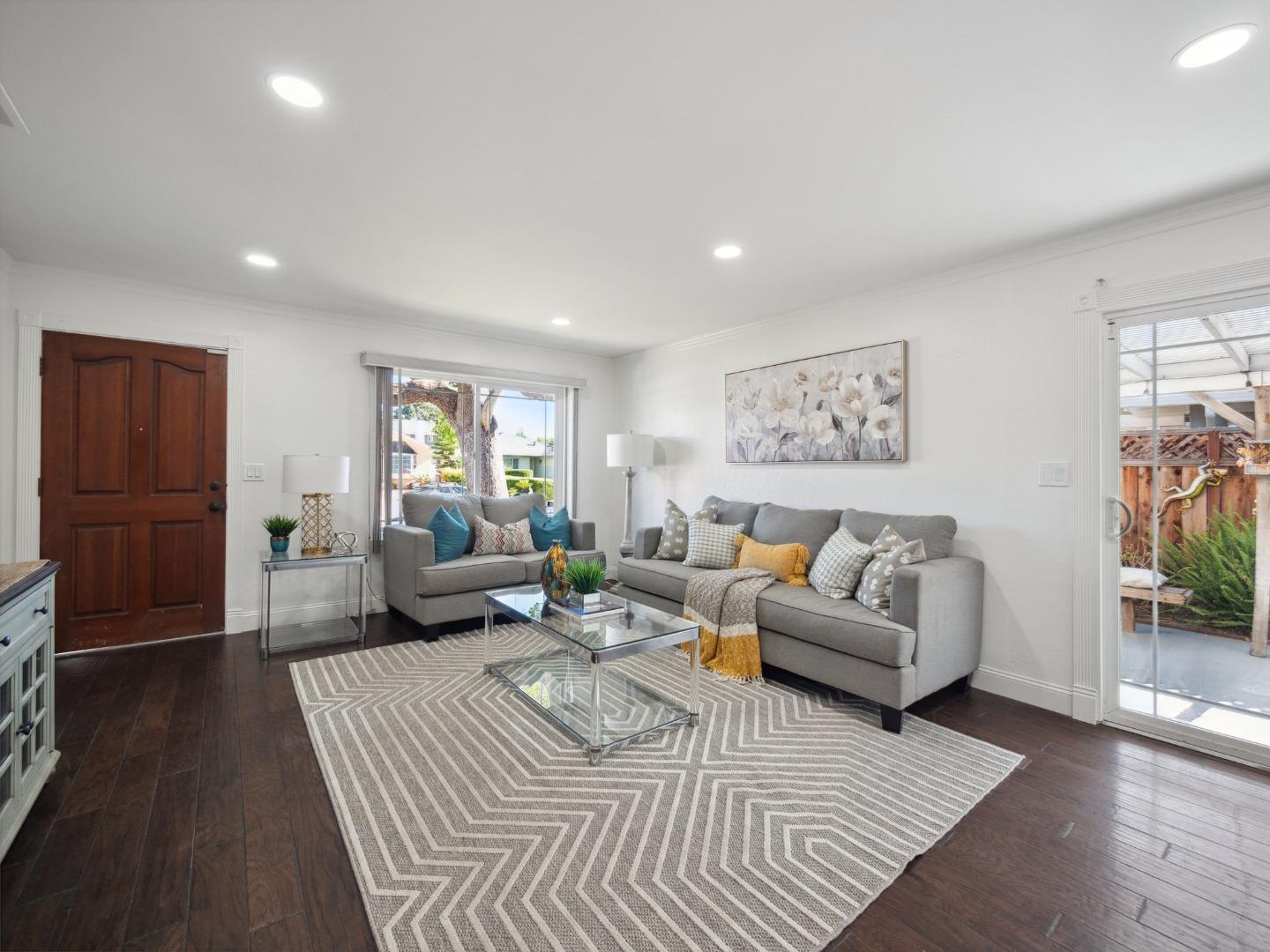 205 Evergreen Way Milpitas, CA 95035 - Photo 9 of 31 a living room with furniture and a couch