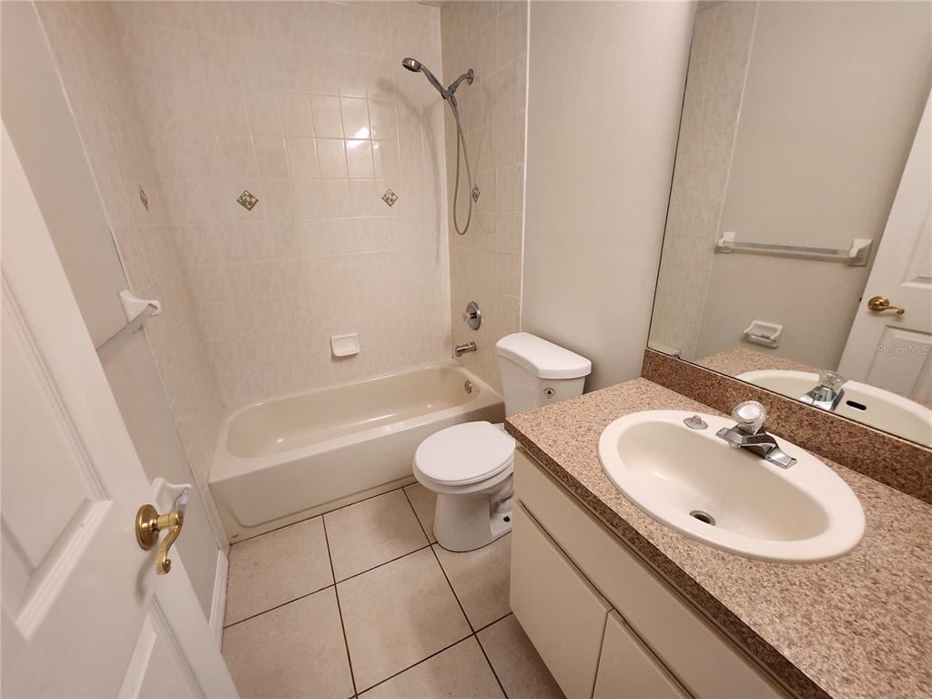 6521 East Grayson Street Inverness, FL 34452 - Photo 16 of 16 a bathroom with a sink a toilet and a bathtub