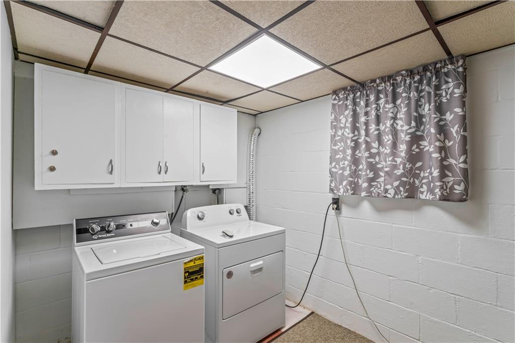 9 McElree Road Washington, PA 15301 - Photo 21 of 32 a utility room with dryer and washer